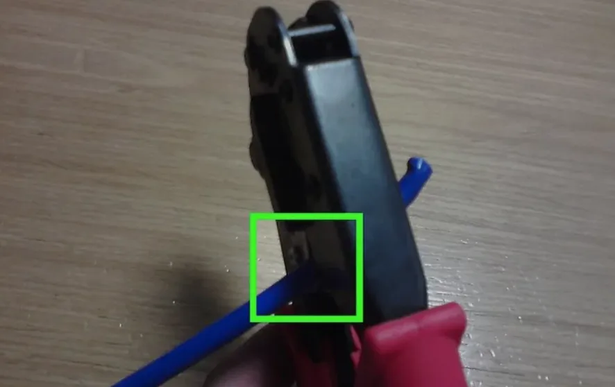 Aligning color-coded wires into RJ45 plug before crimping